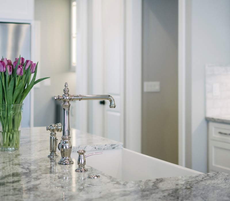 Cabinets with glass doors for a stylish display in Austin kitchens